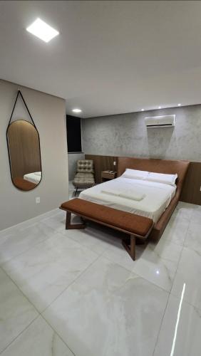 Castelo Apartment | 101 - Área Privativa de Luxo ar condicionado e churrasqueira