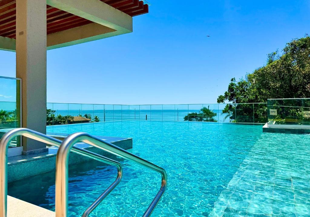Itacolomi Apartment | Apartamento em Condomínio Frente-Mar com Piscinas, Sauna, Academia, Brinquedoteca, 3 quartos Churrasqueira na Sacada, Cozinha Completa e Lazer de Home Club