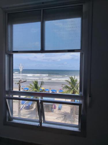 Mongagua Apartment | Apartamento pé na Areia com Garagem no Centro