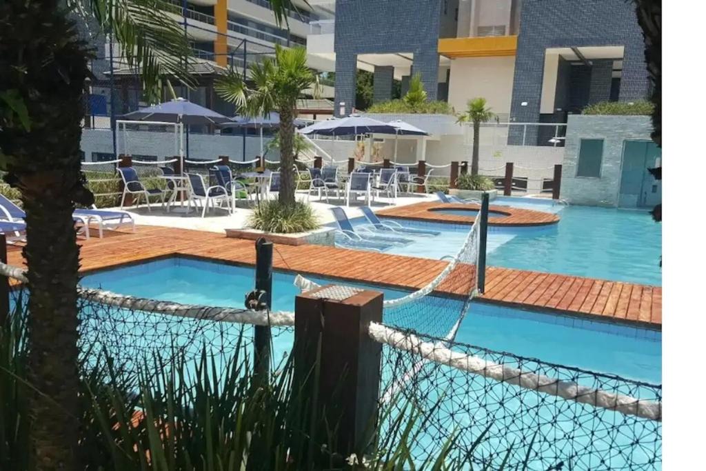 Indaia Apartment | Apto pé-na-areia em Bertioga - Indaia Home Club