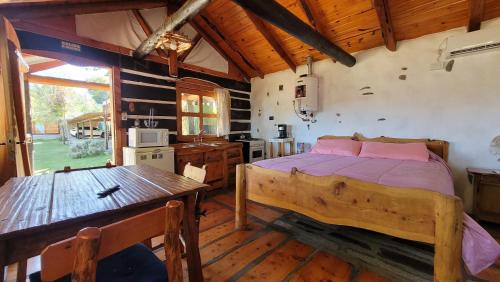 Huerta Grande House | cabaña de sierras- tronco piedra