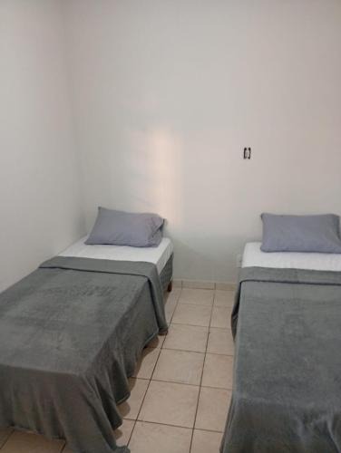 Sagrada Familia House | Casa 3 quartos, cozinha, banheiro, sala, garagem