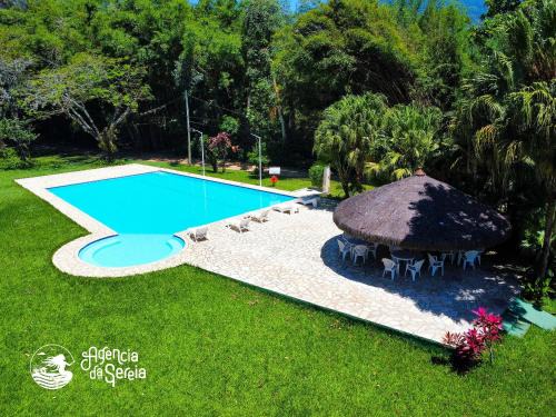 Cocaia House | Casa Aconchegante com Piscina no Condomínio