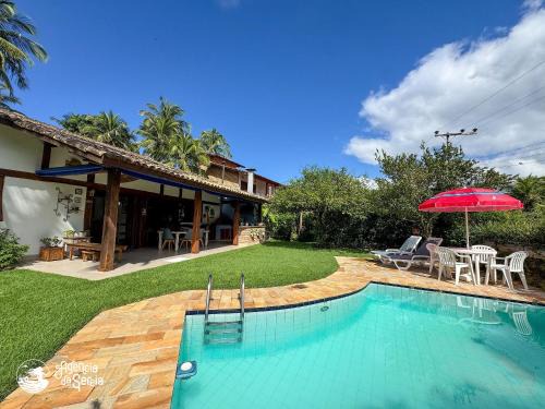 Portinho House | Casa com piscina em condomínio beira-mar