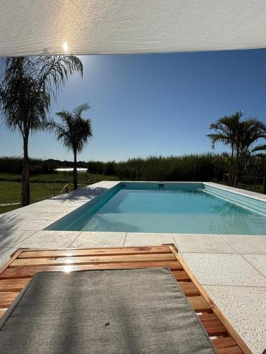 Corrientes House | Casa con Piscina sobre Laguna Brava - Tranquilidad y Naturaleza en Barrio Privado