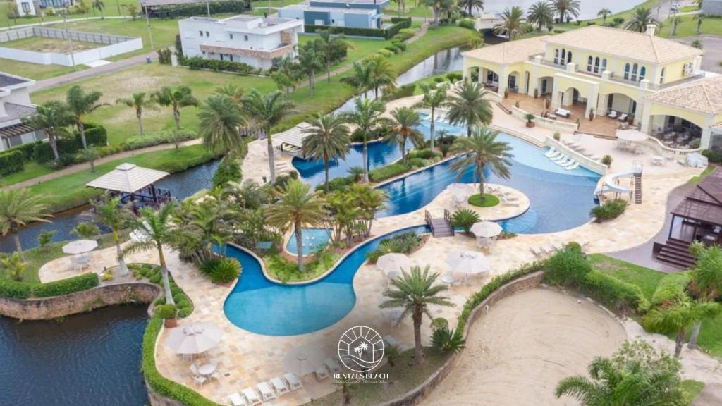 Torres Apartment | Casa Condomínio 5 suítes com piscina a 350m do mar