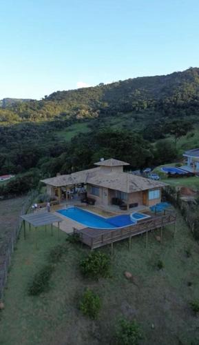 Extrema House | Casa de Temporada - Vista Verde