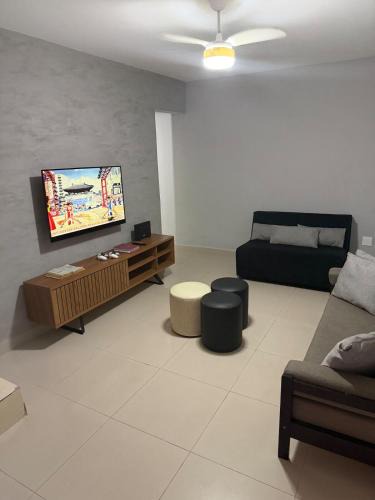 Solemar House | Casa em Praia Grande com Wi-Fi a 50m do mar com 2 suítes e 2 vagas de garagem