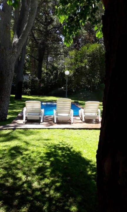 Monte Hermoso House | Casa en barrio Las Dunas con pileta climatizada y parrilla