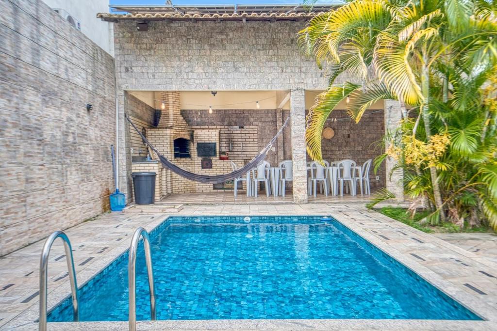 Parque Central House | Casa Espacosa com Piscina e Churrasqueira - Perto da Praia do Forte
