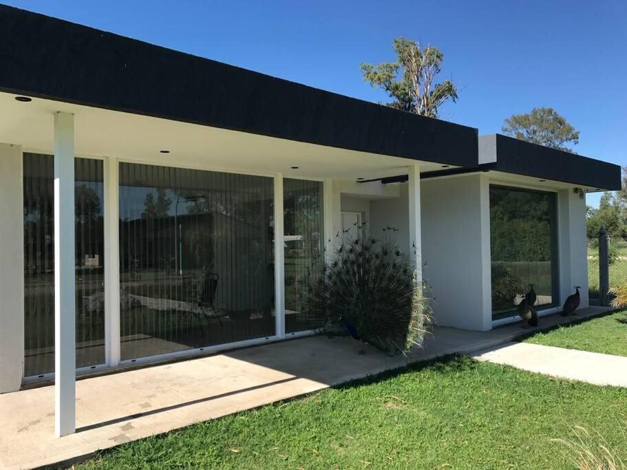 Almafuerte House | Casa frente al lago en barrio privado