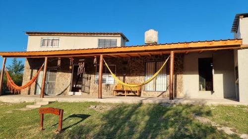 Huerta Grande House | casa rustica dos dormitorios con pileta