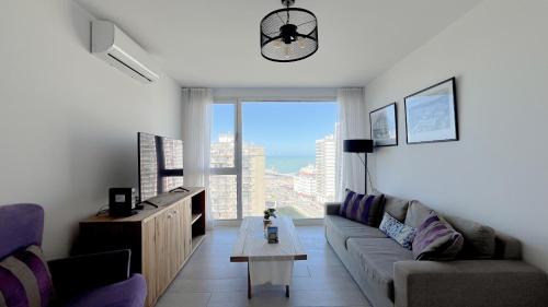La Perla Apartment | Depto Pato - Depto con vista al mar, pileta y gym en edificio Royal Park - Hola Sur