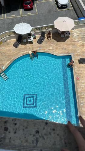 Jardim Flamboyant Apartment | Estúdio luxuoso e aconchegante, com internet, ar condicionado e TV