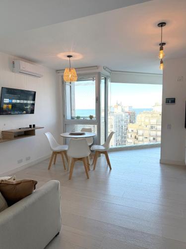 La Perla Apartment | Excelente! Vista al mar con cochera y amenities gimnasio, play room y pileta climatizada