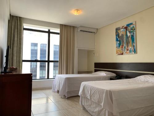 Caminho das Arvores Hotel | Flat Athenas 1402