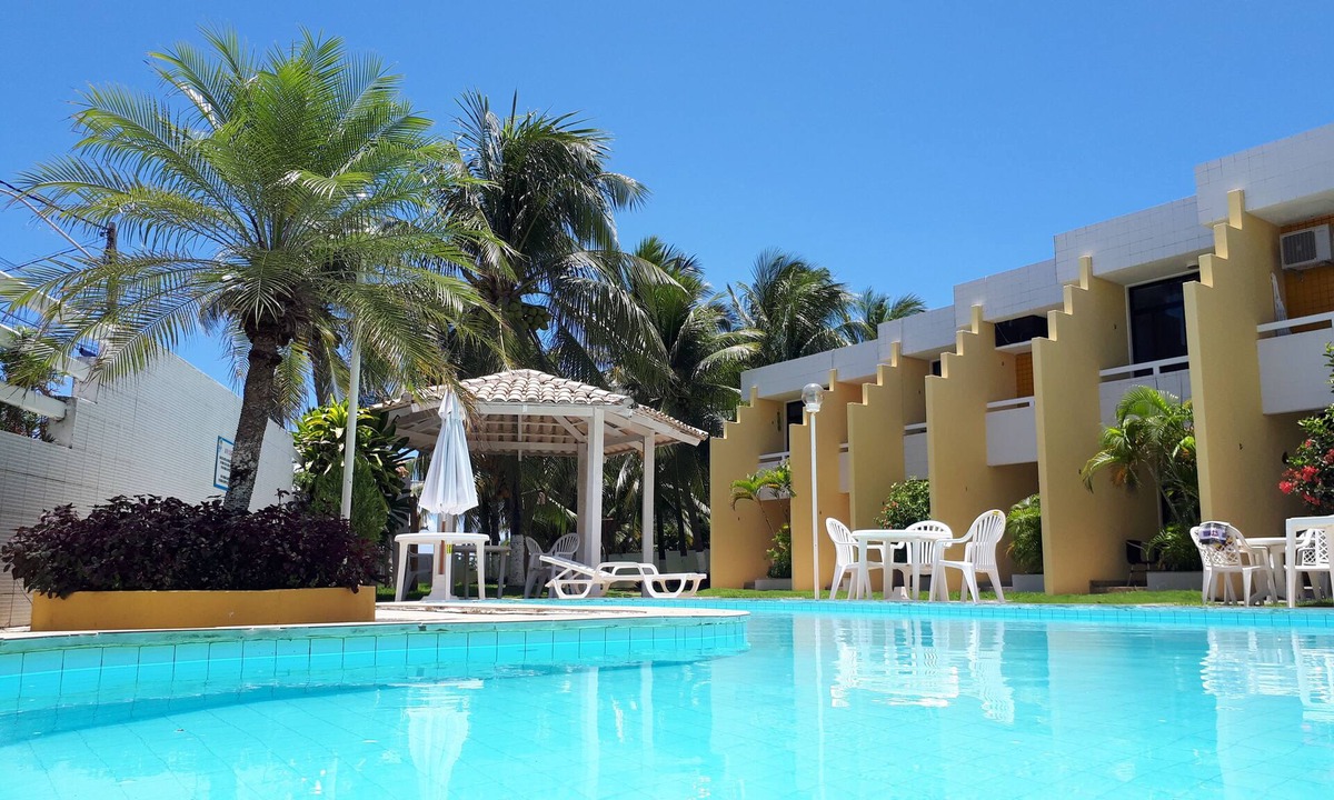 Canto do Mar Apartment | Guarajuba, 2-bedroom duplex right on the beach.