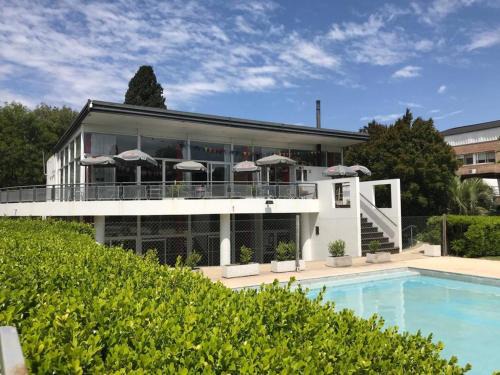 Pilar Centro Apartment | Hermoso apartamento en Country PB con parrilla propia y piscina