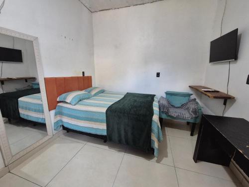 Murucupi House | Hospedaria Caripí - Suíte 03