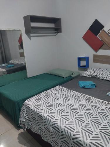 Maringa Apartment | Kit Net 5 azul cama casal