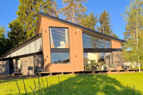 Peninsula San Pedro House | Mágico lugar a orillas del Nahuel Huapi con costa de lago