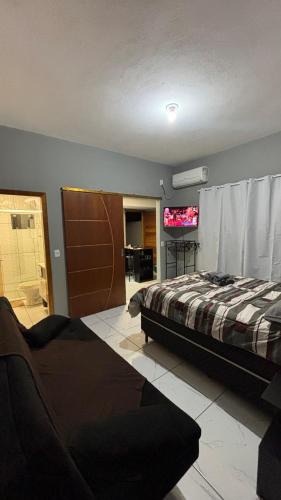 Araquari Apartment | Private Studio with BBQ Grill, TV, AC, and Wi-Fi