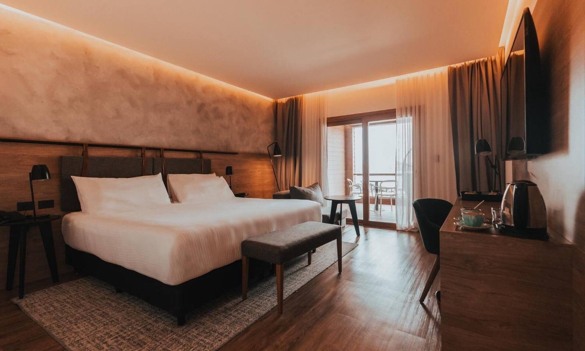 Villa General Belgrano Hotel | Relaxing Stay: Outdoor Hot Tub, Sauna & Tennis Courts | Near Brewer Park