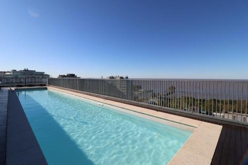 Olivos Apartment | SkyPort Olivos vista al rio pileta y cochera