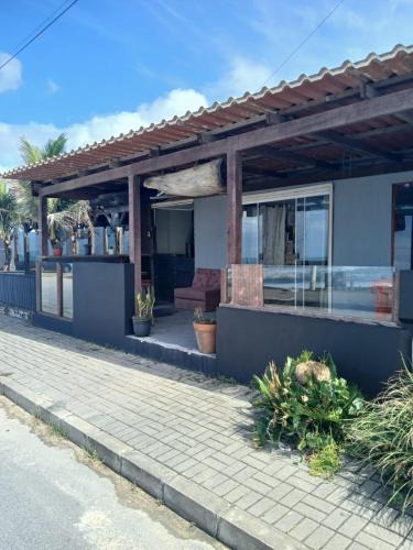 Praia Grande Apartment | Suíte beira-mar