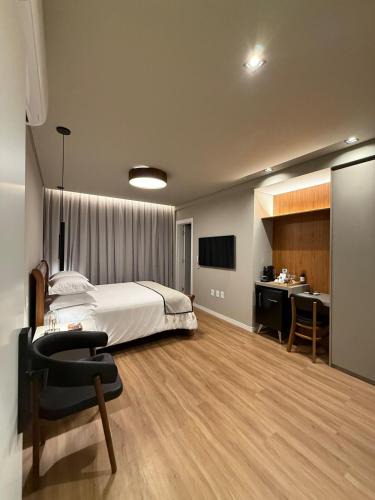 Industrial Apartment | Suite Boutique 102 Cheia de Graça