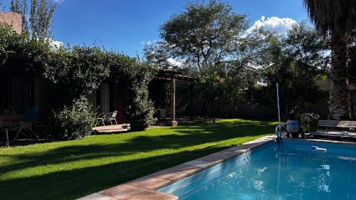 Guaymallen House | Terra Huarpe suite privada con pileta