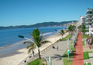 Apt. cover with great views of the sea front promenade, center.(See rates). in Itapema