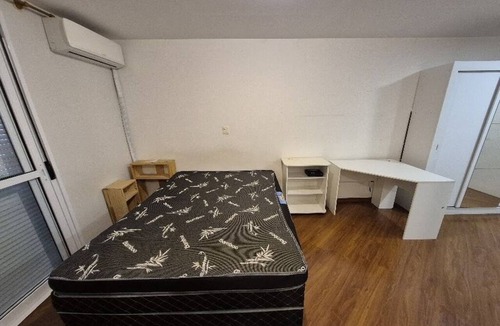Consolacao Apartment | 5 minutes from Paulista Avenue. Apartment with balcony and air conditioning.
