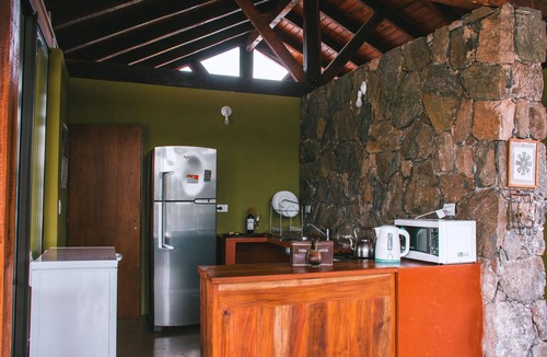 San Pedro Norte Cottage | A house in the countryside, surrounded by nature, with horses.