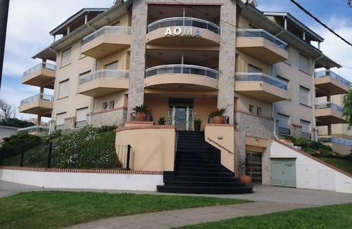 Villa Gesell Apartment | AOMA Apart. 3 minutes from the beach, overlooking the city and the sea.