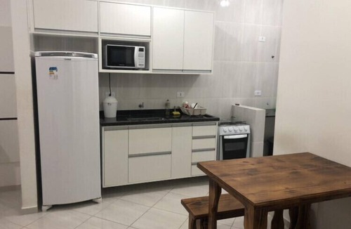 Maranduba Apartment | Ap 106: Access to walk to Maranduba beach, Ap with suite, led TV, barbecue