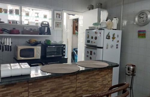 Capim Macio Apartment | Apartment with a living room, kitchen, 2 bedrooms, utility area, and garage, located 2 km from Praia Negra Beach.