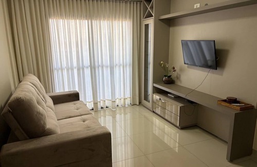 Plano Diretor Sul Apartment | Apartment with AC in living room and bedrooms, with balcony and swimming pool