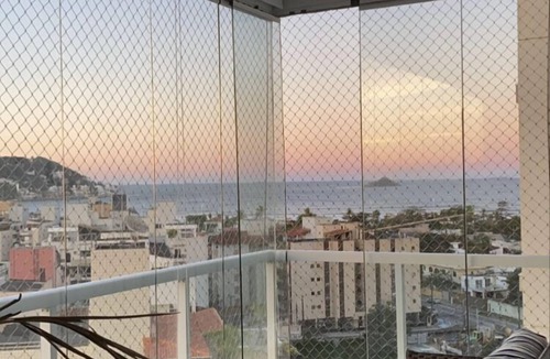 Parque Enseada Apartment | Apartment with gourmet balcony, ocean view and spa.