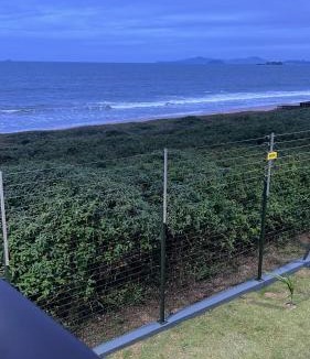 Barra Velha Apartment | Apartment with sea view, barbecue, leisure area