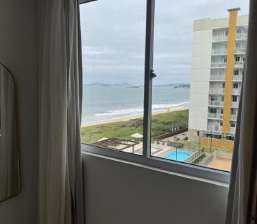 Barra Velha Apartment | Apartment with sea view, barbecue, leisure area