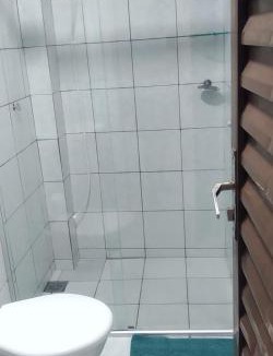 Maria Luiza Apartment | Apto 03 - 1 quarto com 2 camas solteiro e garagem, possui ventilador de teto