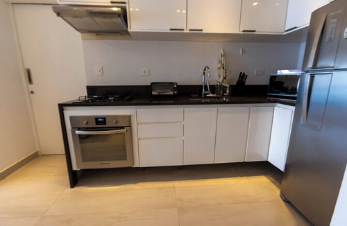 Aparecida Apartment | Apto confortável com linda vista frente para o mar