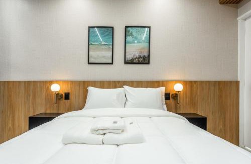 Embare Apartment | Apto Elegante no Embaré Perto da Praia Ar Cond