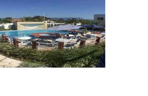 Indaia Apartment | Apto pé-na-areia em Bertioga - Indaia Home Club