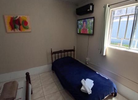 Centro House | Básico e funcional, com 2 ambientes, sem fogão, com garagem, zona nobre
