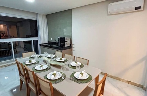 Praia do Morro Apartment | Beachfront apartment in Praia do Morro with air conditioning and barbecue.