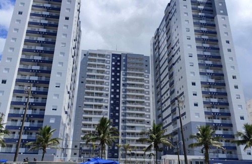 Mongagua Apartment | Beachfront apartment with pool for families, pets allowed.