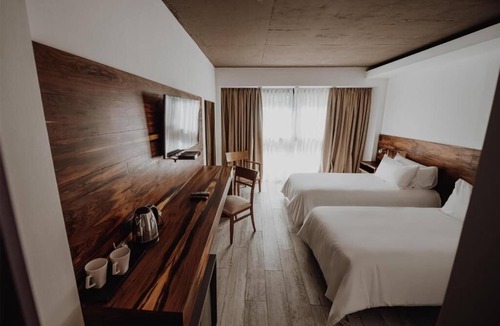 Rio Cuarto Hotel | Breathtaking Modern Oasis: Indoor Heated Pool, Outdoor Pool & Free Breakfast