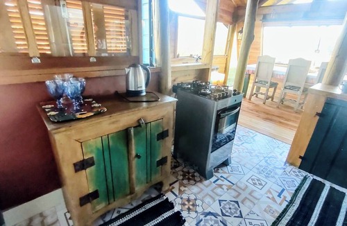 Cambara do Sul Cabin | By the stream, a tranquil cabin nestled in the heart of nature.